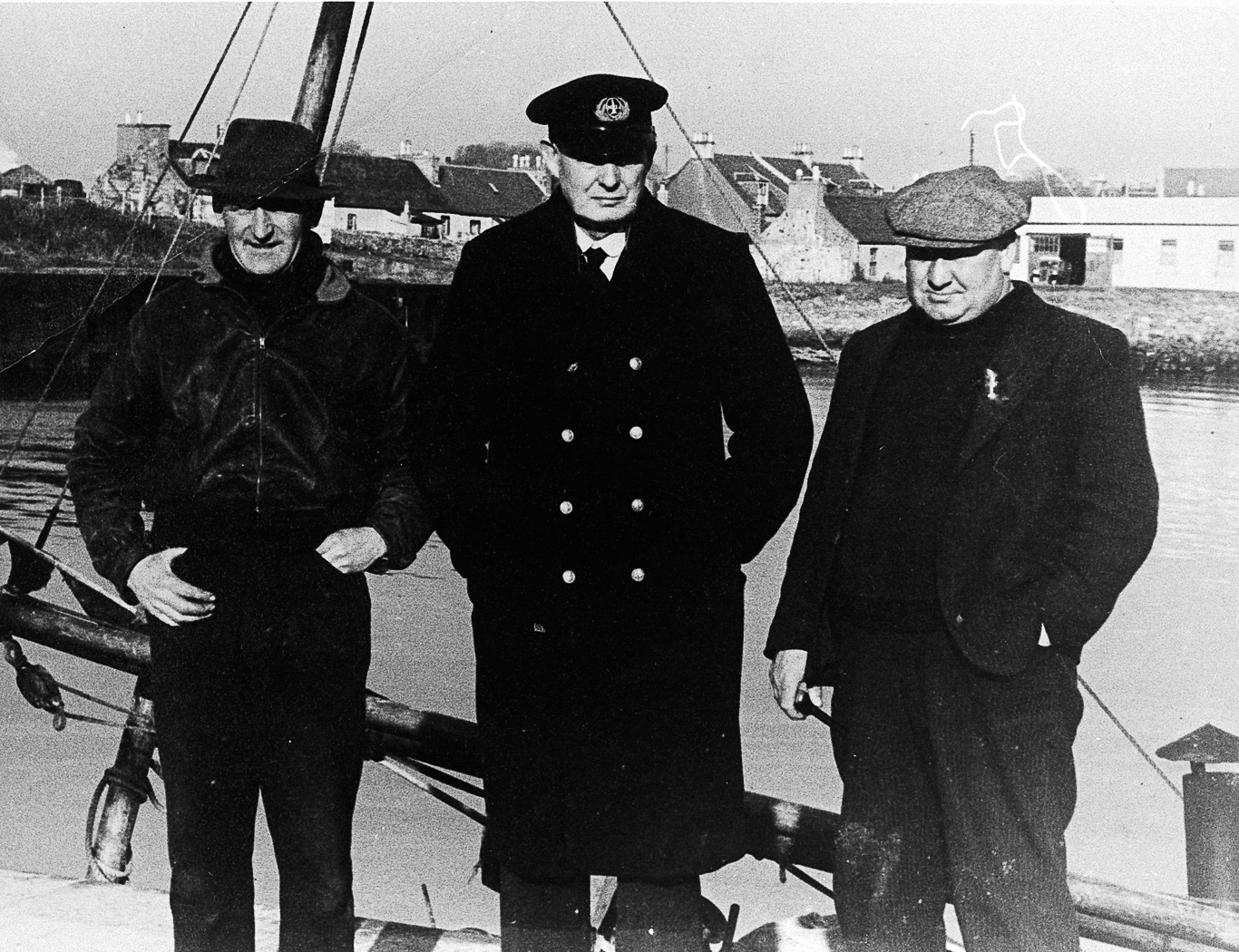 Portrait of ringnet skippers Andrew McCrindle and Tom McQuiston with Archie Girvan, Girvan, c.1960. Andrew McCrindle was skipper of 'Alipeds VII'. Archie Girvan was captain of the Ailsa Craig boat. L-R: Andrew McCrindle, Archie Girvan, Tom McQuiston.