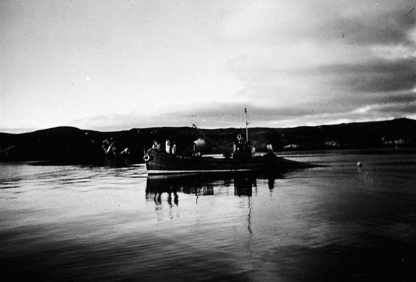 Fisherman shooting a ringnet, possibly onboard 'Margaret Ann II', OB198.