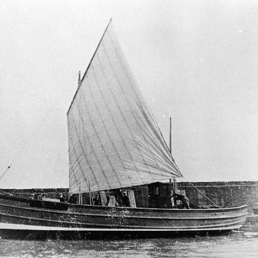 'Falcon', CN97, in harbour, St Monans, 1922. 'Falcon', CN97, was built by J. Miller and Sons boatyard in St Monans for Robert Robertson of Campbeltown. She was the first canoe-sterned ringnetter.