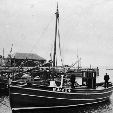 Ringnetter 'Aliped IV', BA214, in harbour, Girvan. Behind her, 'Osprey', BA291. 'Aliped IV' belonged to the McCrindle family of Girvan.