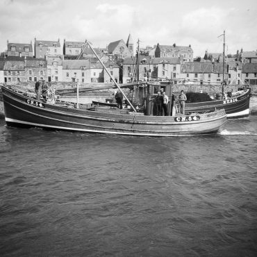 'Almanzora' CN54, in harbour, St Monans, 1949. 'Almanzora', CN54, was built by J. N. Miller boatbuilders, St Monans, for the Robertson brothers who lived on the west coast. She was 53ft long and weighed 23 tons. She later became 'Mairead', TT104, then 'Sancta Virgo', CY254. She stopped fishing in 1979 then was later sold abroad.