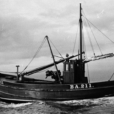'Girl Mary', BA211, at sea, 1946. She was built in 1945 by J.N. Miller boatbuilders, St Monans as a dual purpose ringnetter and seiner. She later became 'Marie', BA211. In 1996, she was being used as a houseboat in Leith.