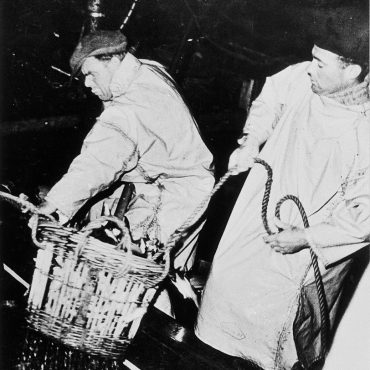 Crew using the 'stick basket', 1961.